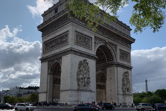Arc de Triomphe and the Champs-Elysees Discovery Private Tour - The Arc de Triomphe is more than a landmark pose