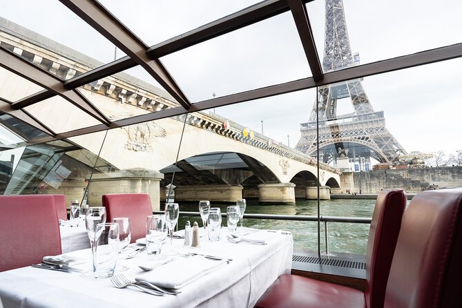 Bateaux Mouches Lunch Cruise on the Seine River in Paris - Cruising past Paris icons in daylight: Eiffel, Notre-Dame, Louvre, and the riverfront magic
