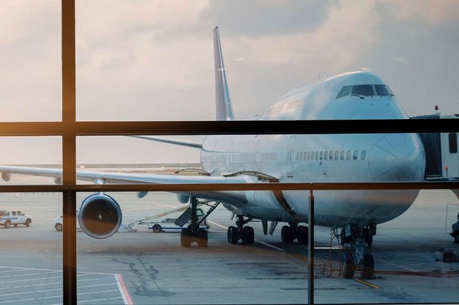 Best Private Airports Transfers - Luxury Minivan Service - Driver waiting while you collect luggage and clear customs