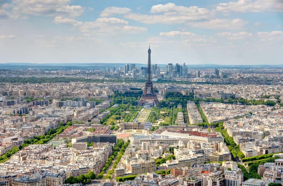 Best View of Paris: Montparnasse Tower Guided Tour - Monocle Opticien créateur, then Montparnasse Cemetery for the human stories