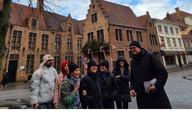 Bruges Guided Day Tour from Paris with Canal Cruise - Market Square and the Belfry: Icons With Context
