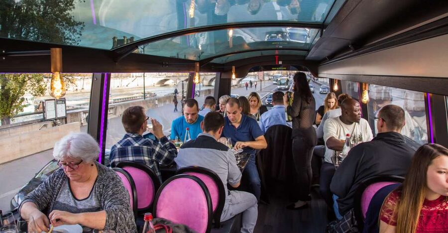 Bus Toqué Champs Elysées Tour w/ 3-Course Dinner & Champagne - What the Bus Toqué setup feels like: 4 meters up with glass-roof comfort