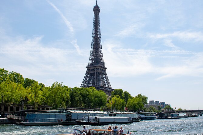 City Walking Tour: See the Top 5 Paris Highlights in a Day - Notre-Dame neighborhood walk, with renovation in the background