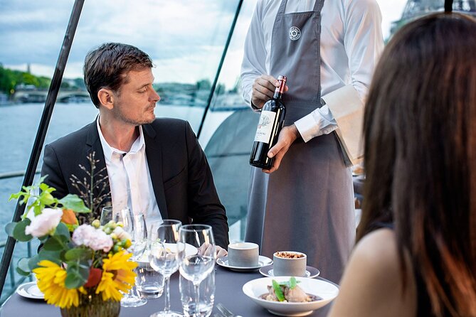 Early evening Dinner Cruise with drinks by Bateaux Parisiens - Cruise route highlights, Eiffel Tower to Louvre facades