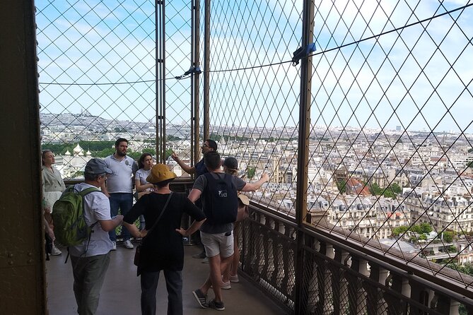 Eiffel Tower Guided Tour by the Stairs up to Second Floor - First level break: panoramic views plus time for shops, cafes, and exhibits