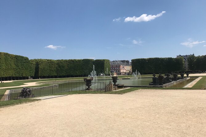 Electric 2-wheeler tour of the Chateau Park and Gardens - Grand Trianon area: old gate vibes and pink marble
