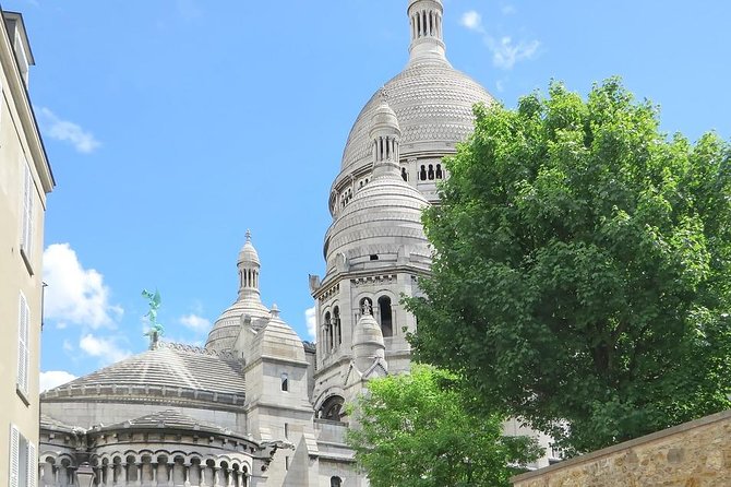 Explore Montmartre like a local - Private walking tour - Painters market energy and the art in action feeling