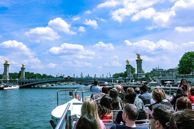 Full Day Paris City Pass: 50 Museums, Unlimited Hop On/Off Cruise - Hop-on hop-off Seine cruise with champagne, and why timing matters