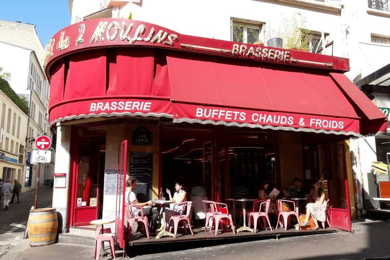 German private Walking Tour through Montmartre & Passages - Place du Tertre and Montmartre streets away from the main crush