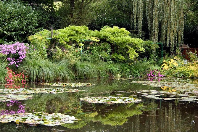 Giverny and Monet's Garden Half-Day Trip from Paris - Clos Normand in two directions: rectangular garden and Spring-to-Autumn color