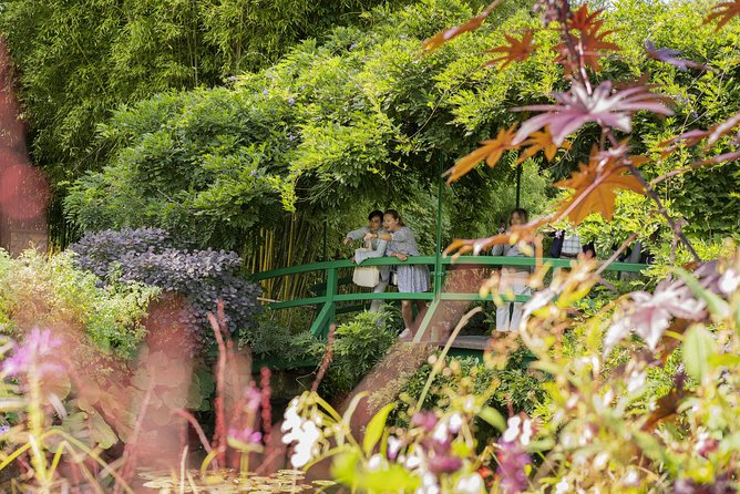 Giverny & Versailles Audio Guided Day Trip with Lunch from Paris - Clos Normand: the Japanese bridge, water lilies, and Monet’s garden logic
