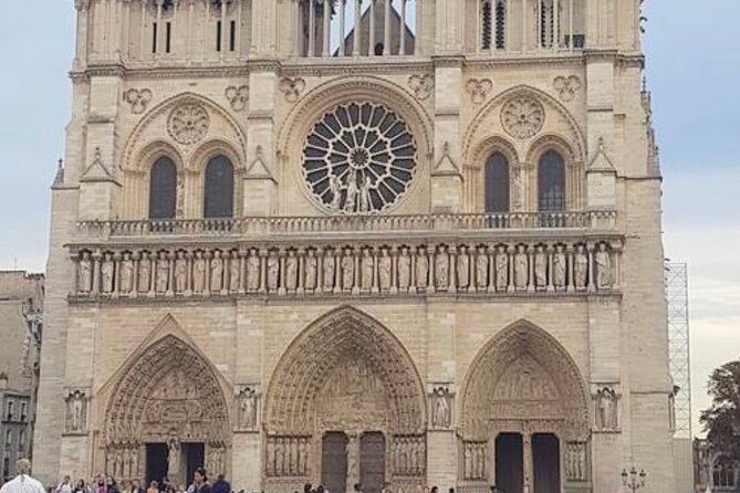Half Day Walking Tour to Over 30 of the Top Sights of Paris - Eiffel Tower views, Moulin Rouge, and the value of photo stops