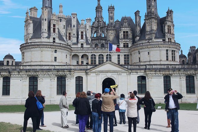 Loire Valley Castles Day Trip from Paris with Complementary Wine - From the Paris Catacombs to Loire Valley in a USB-charged coach