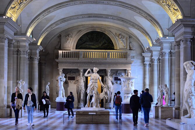 Louvre Late Opening Guided Tiny Group Tour - Where you meet: Le Kiosque des noctambules at Place Colette