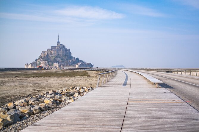 Mont Saint Michel Guided Day Trip with Hotel Pickup - The “Mont” walk and medieval lanes: cobblestones, shops, and a slower pace
