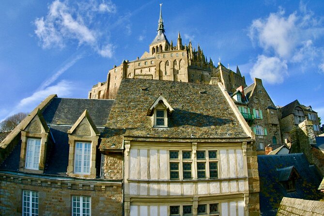 Mont Saint-Michel Small-group by Minivan from Paris with Calvados - Reaching the Abbey top: narrow streets, crowds, and Atlantic views