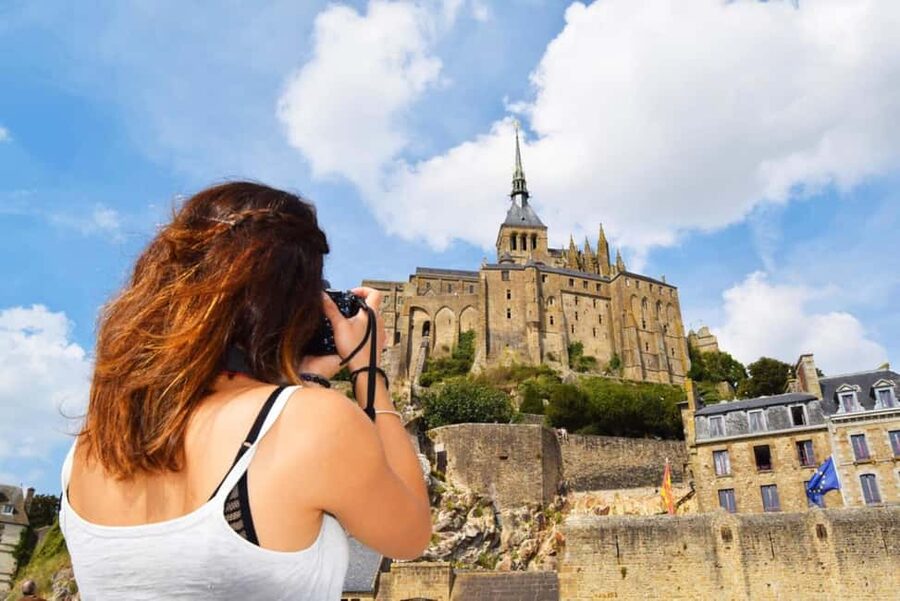 Mont Saint-Michel Small-Group Day Trip from Paris with Abbey Ticket - Arriving at Mont Saint-Michel: Causeway Views and the Fortified Village Walk