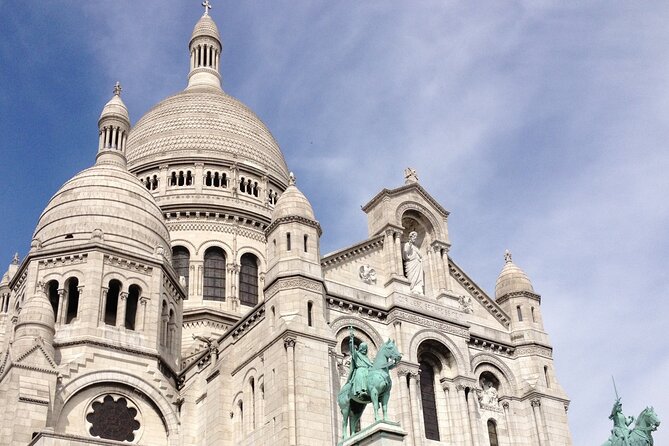 Montmartre - A Canvas of Art and History (Self-Guided audio tour) - Musee de Montmartre: the pink façade moment and the paid break