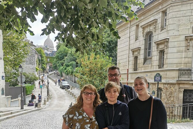 Montmartre and Sacre Coeur Private Guided Tour in Paris - A plaza full of art energy and easy souvenir hunting