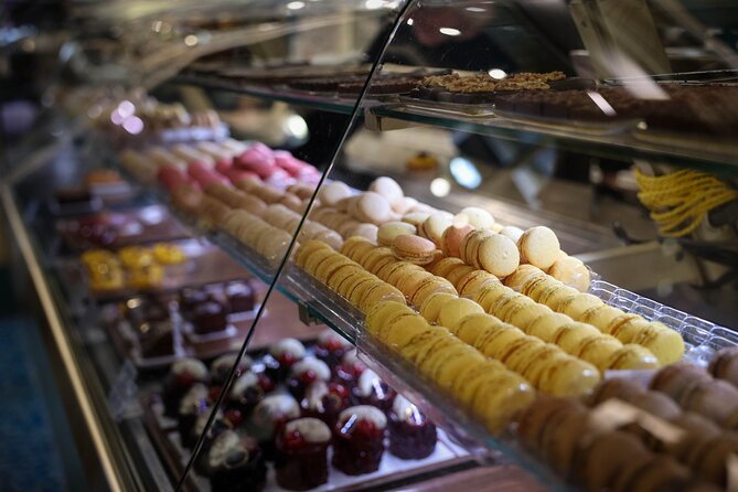 Montmartre Food Tour: The Most Complete Paris Food Experience - Entering Montmartre at Place des Abbesses, then walking Rue des Abbesses