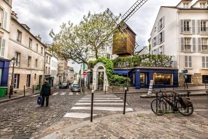 Montmartre Guided Tour with Sacré Cœur Church & City Views - Sacré-Cœur and the city views from the top
