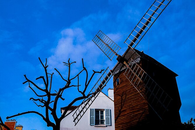 Montmartre Marvels Small Group Guided Stroll in Bohemian Paris - Moulin de la Galette: Windmill Views and Renoir’s Connection