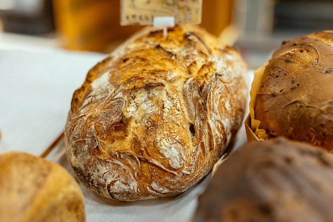 Montmartre Private Food Walking Tour With Locals: The 10 Tastings - Start with Moulin Rouge bites, then let the guide set the rhythm