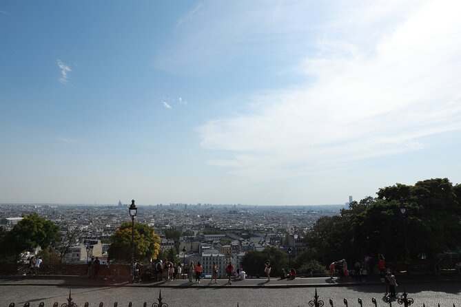 Montmartre Private Walking Tour - Stop 4: Place du Tertre, cobbles, artists, and the postcard that isn’t a lie