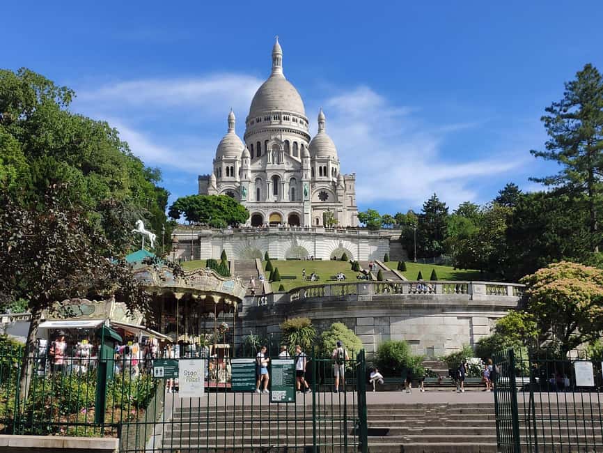 Montmartre Walking Tour with a Local Guide - Moulin de la Galette and La Maison Rose: Where the Streets Look Like a Set