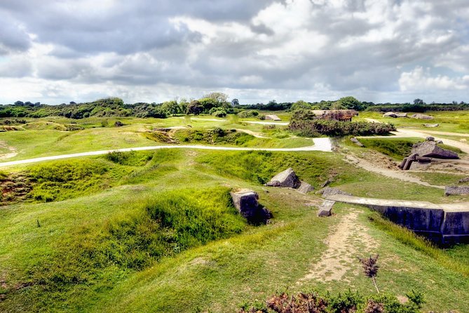 Normandy D-Day Beaches and American Cemetery Day Trip from Paris - Pointe du Hoc: cliffs, craters, and the story that grabs first