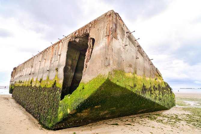 Normandy D-Day Beaches and American Cemetery Day Trip from Paris - Arromanches: lunch, the harbor ruins, and why logistics mattered