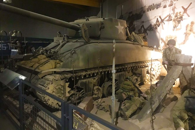 Normandy D-Day Beaches Private Day Trip with American Cemetery & Omaha Beach - Pointe du Hoc cliffs: 27-meter drama and a free stop