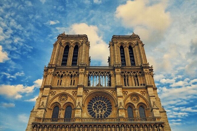 Notre Dame Surroundings with Entry Ticket to Archeological Crypt - Stop 2: Notre-Dame exterior walk, symbols on the façade