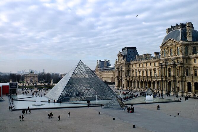 Paris 10-Hour Guided Louvre, Eiffel Tower & Seine River Cruise - Notre-Dame de Paris: short stop, no entry, and it is currently under renovation