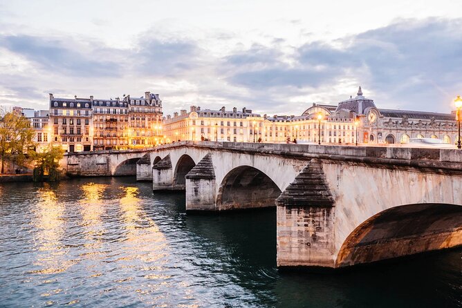 Paris 10-Hour Guided Louvre, Eiffel Tower & Seine River Cruise - Le Marais walk: cobblestones, boutiques, and neighborhood energy