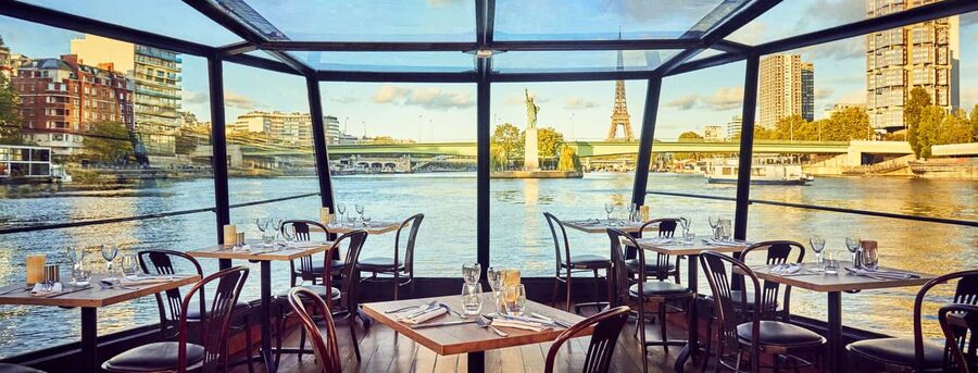 Paris: 3-Course Lunch Cruise on the River Seine - The Boat Experience: Glass-Enclosed Views and a Relaxed Pace