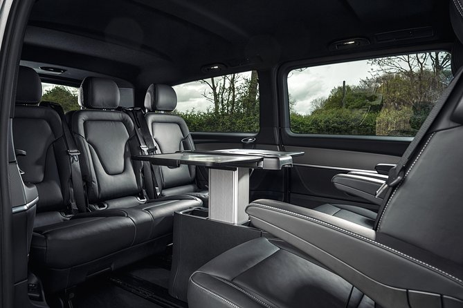 Paris Airport Transfer: Paris Airport CDG to Paris by Luxury Van - Finding Your Driver in the Arrivals Hall, Not the Parking Lot