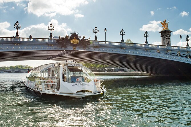 Paris: Batobus Hop-On Hop-Off Cruise & Landmarks Audio Tour - Stop by Stop: Eiffel Tower to Champs-Élysées in One Easy Route