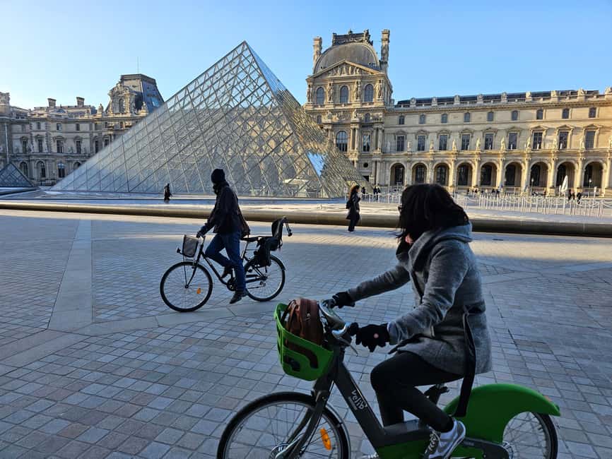 Paris Before the Crowds: Sunrise Bike Tour with Breakfast - Riding along the Seine, where the city feels bigger
