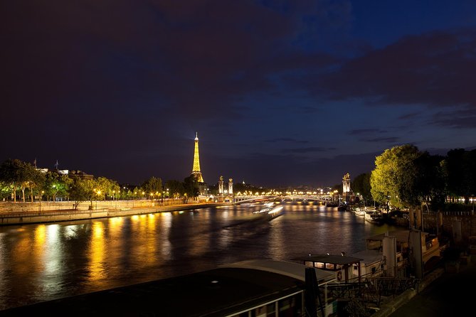 Paris By Night with Seine River Cruise and Roundtrip Luxury Transportation - Illuminated Paris in Motion: Arc de Triomphe, Notre-Dame, and More