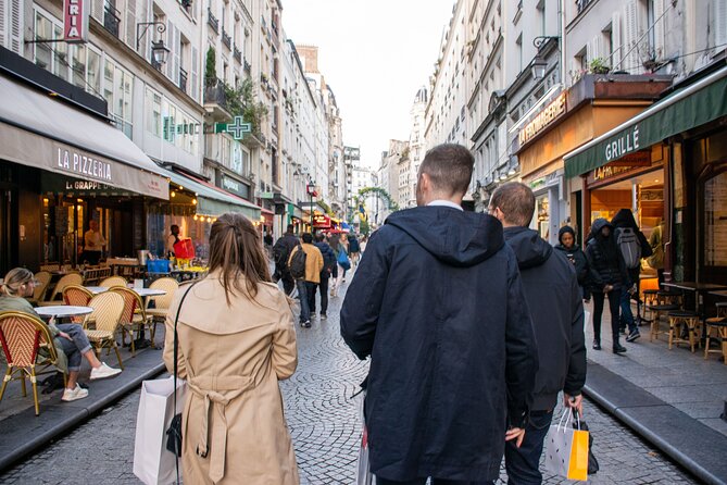 Paris Christmas Food Tour with a Local Guide, and Seasonal Treats - Saint-Germain-des-Pres quarter: Christmas market energy plus iconic cafés
