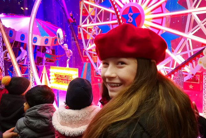 Paris Christmas Illuminations and Local Festivities Private Tour - Tuileries Gardens Christmas Market and the Ferris Wheel Angle