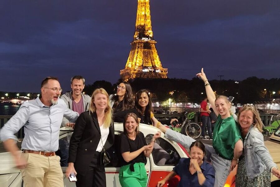 Paris: City Sightseeing Tour at Night in Vintage Car - Palais Garnier, Opera corner views, and the glow on stone