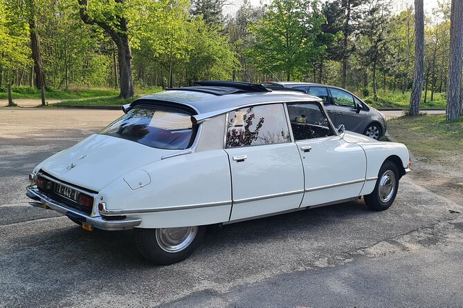 Paris City Tour 3h00 Citroën DS Vintage with Open Roof - Price, whats included, and optional champagne or macaroons