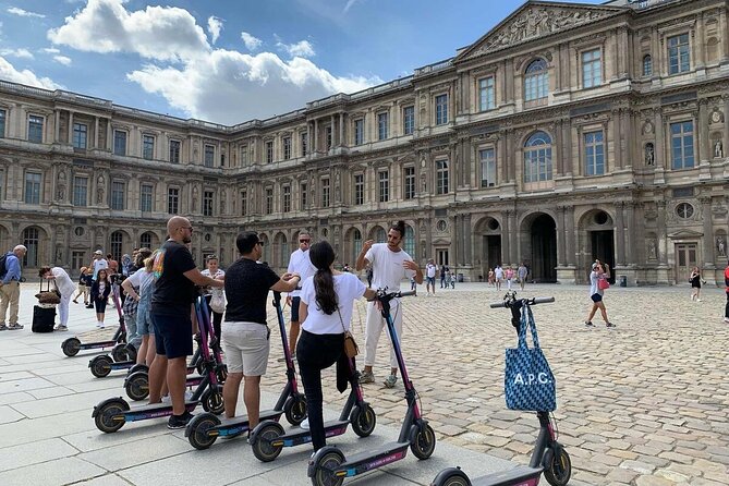 Paris City Tour by E-Scooter with Fun Guide (Small groups) - Champs-Élysées and Arc de Triomphe: a big boulevard moment, then photos at the arch