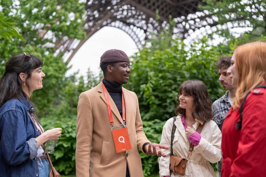 Paris: Eiffel Tower Guided Tour with Summit Access - From security to the 2nd floor: what the tour does with your time