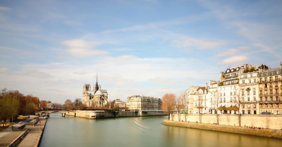 Paris: Eiffel Tower Tour & Seine River Cruise Tour - The Eiffel Tower history walk: Dame de Fer at street level