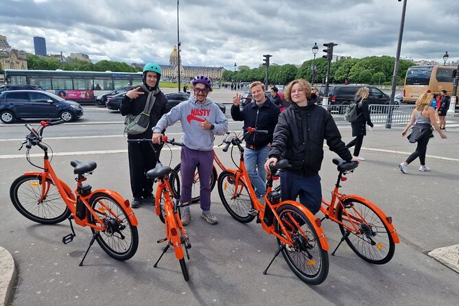 Paris: Guided City Sightseeing Tour by Bike/E-Bike - Invalides to the Eiffel Tower: military gravitas to steel icon photos