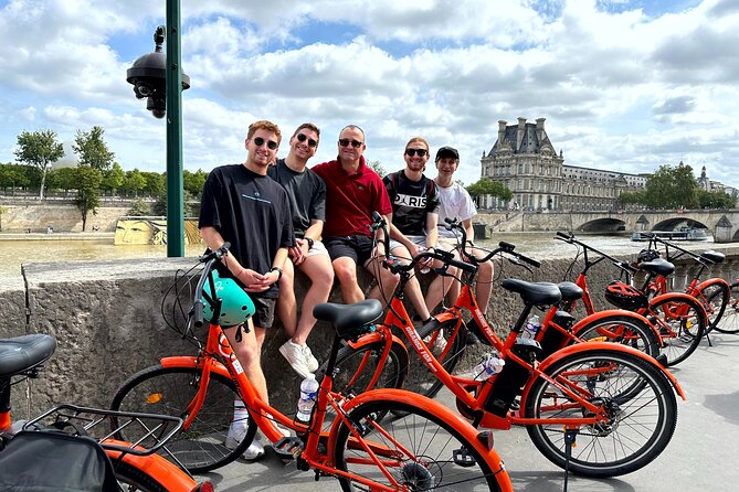 Paris Guided City Sightseeing Tour by Bike or E-Bike - Stop 7 to 10: Saint-Jacques Tower, Hotel de Ville zone, and Île de la Cité