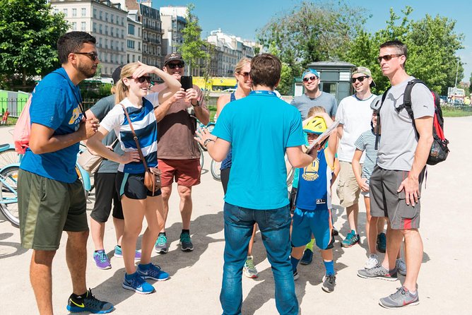 Paris Highlights Bike Tour: Eiffel Tower, Louvre and Notre-Dame - Getting started at Place Saint-Michel and getting rolling